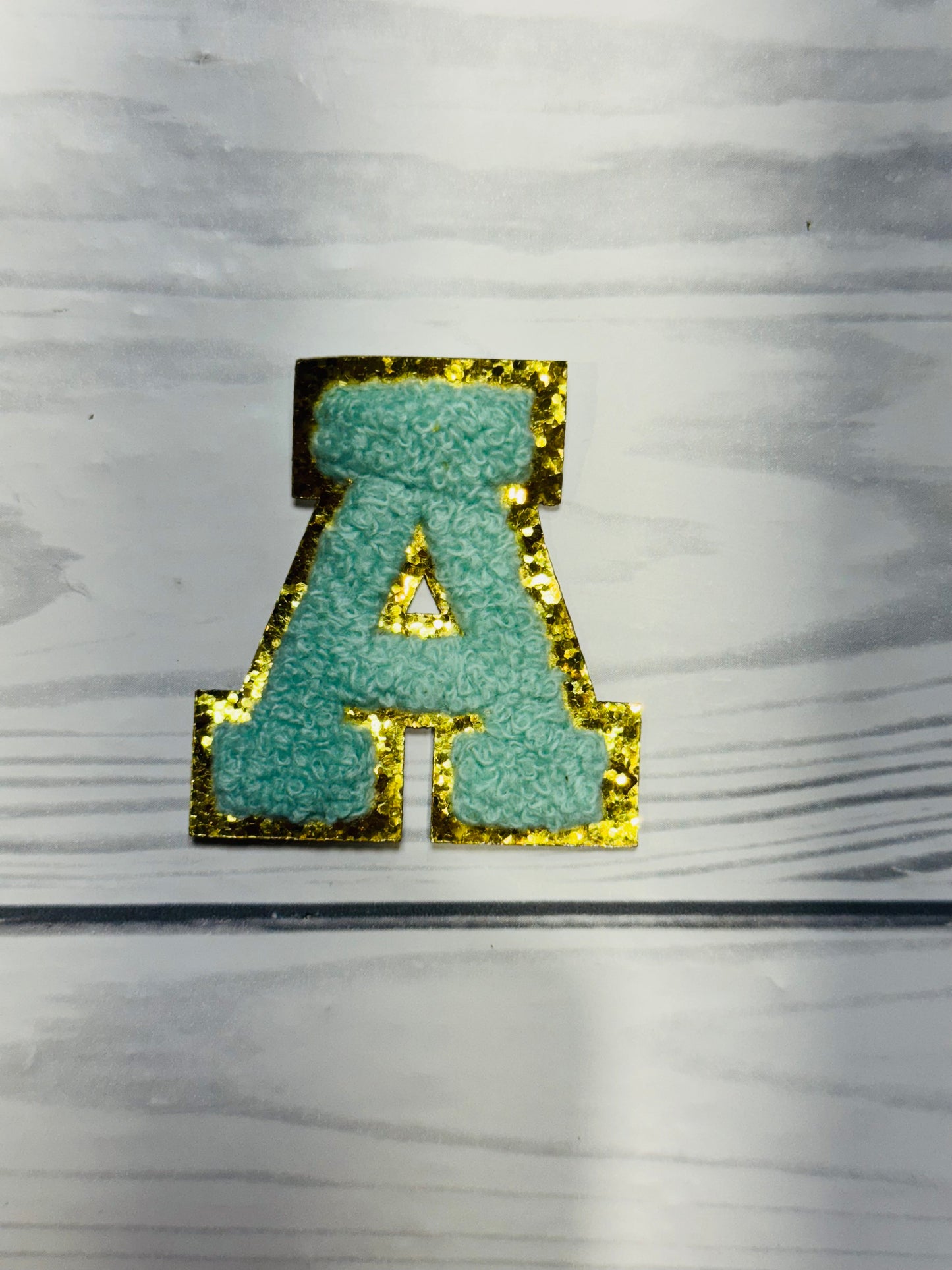 A TEAL GOLD GLITTER